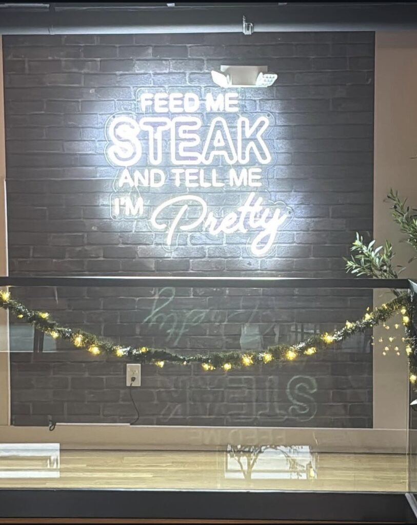 'Feed me steak and tell me I'm pretty' sign at Allendale Steakhouse