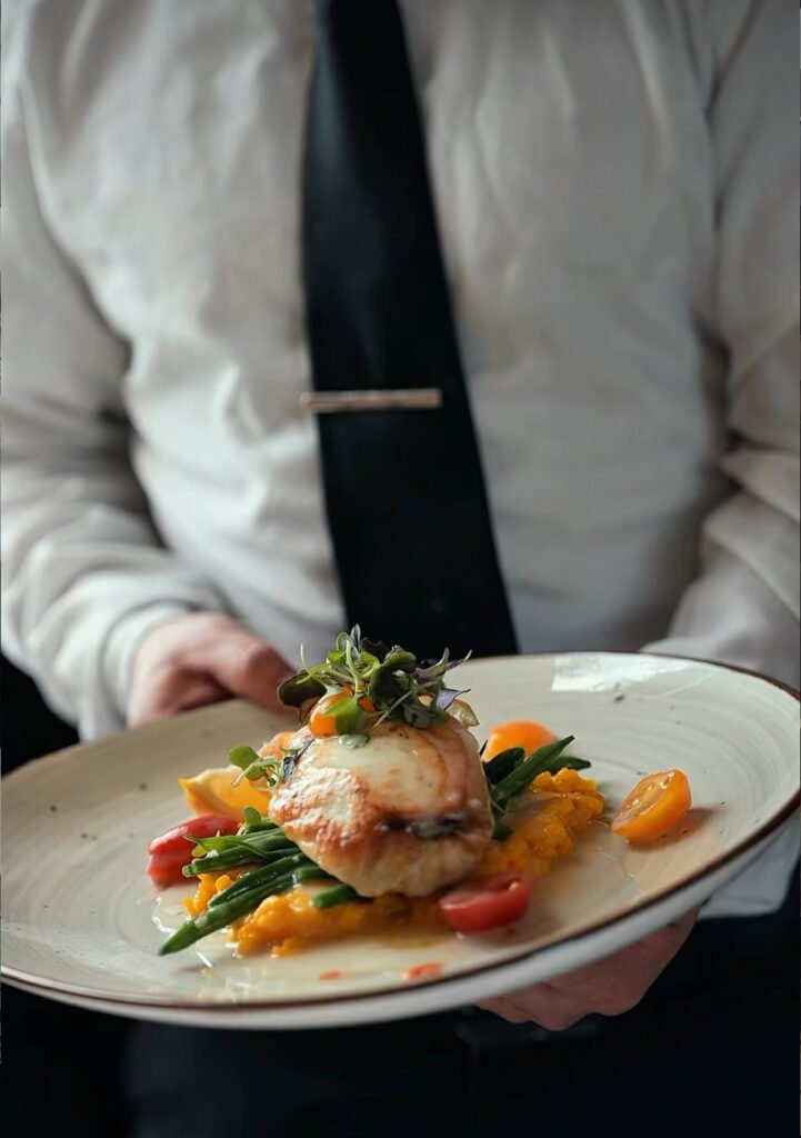 Pan-seared halibut entrée at Allendale Steakhouse